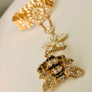 Bracelet with bee ring attached